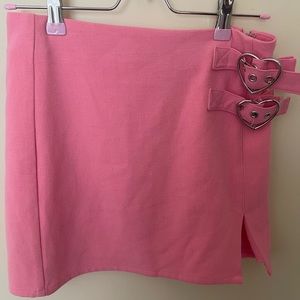 Never worn Dolls Kill Sugar Thrillz Pink Heart Buckle Mini Skirt Sz Small